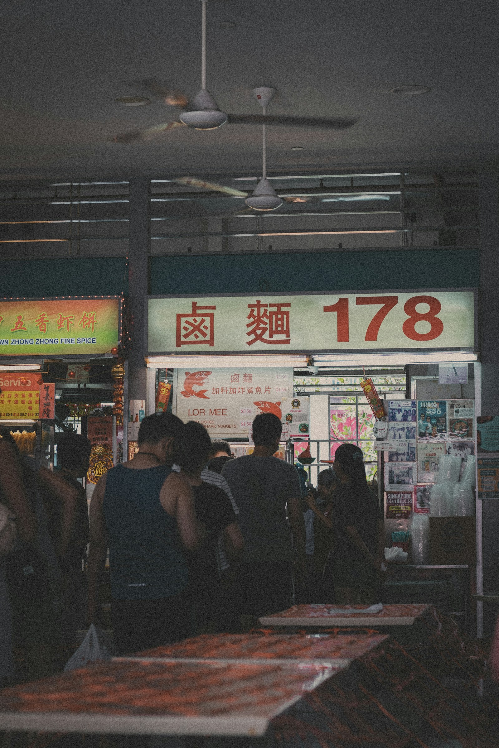 Small shopfront glowing at dusk
